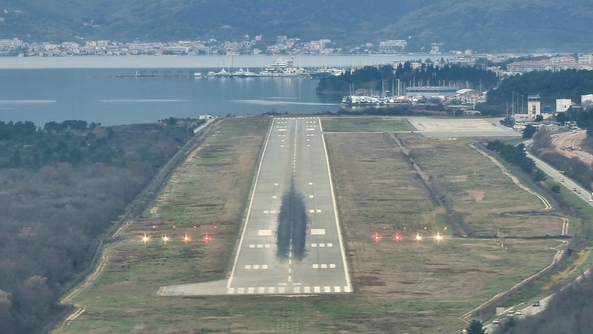 Student beside aircraft